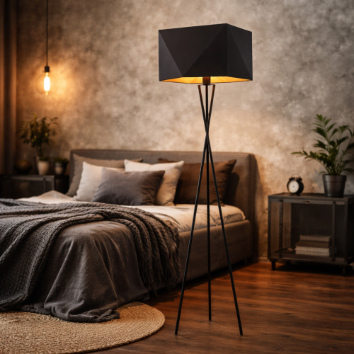Nowoczesna lampa podłogowa tripod w stylu industrialnym idealnie pasuje do sypialni loftowej. Minimalistyczna forma, czarny kolor i geometryczny abażur tworzą eleganckie, klimatyczne oświetlenie wnętrza.
