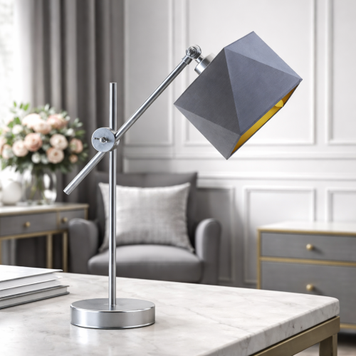 Lampa stołowa regulowana LATOYA GOLD to elegancka lampka nocna w stylu glamour z ruchomym ramieniem i abażurem ze złotym wnętrzem. Idealna jako lampka na biurko lub do sypialni. Funkcjonalna, stylowa i kompatybilna z LED