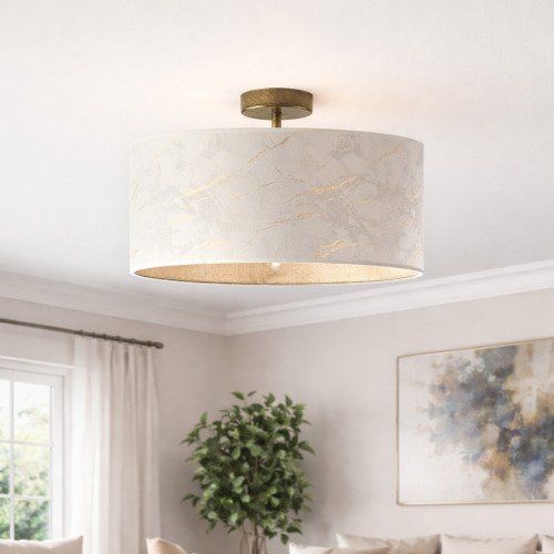 Elegancka lampa sufitowa glamour o średnicy 40 cm i wysokości 30 cm to idealne połączenie stylu i funkcjonalności. Marmurowy wzór z subtelnymi złotymi żyłkami oraz złote wykończenie dodają wnętrzu luksusu i ciepła. Doskonała do salonu i sypialni.
