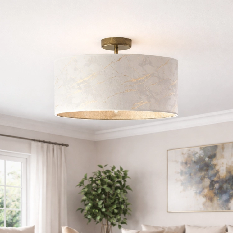 Elegancka lampa sufitowa glamour o średnicy 40 cm i wysokości 30 cm to idealne połączenie stylu i funkcjonalności. Marmurowy wzór z subtelnymi złotymi żyłkami oraz złote wykończenie dodają wnętrzu luksusu i ciepła. Doskonała do salonu i sypialni.