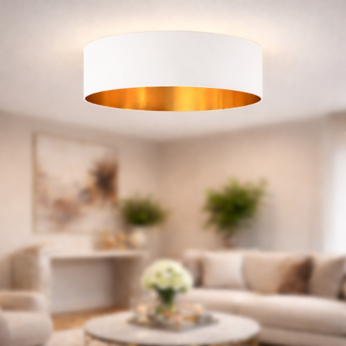 Plafon sufitowy nowoczesny z białym abażurem i złotym wnętrzem to idealne rozwiązanie do eleganckich wnętrz. Zapewnia ciepłe, przytulne światło i podkreśla styl aranżacji. Lampa sufitowa do salonu łączy funkcjonalność z luksusowym designem.