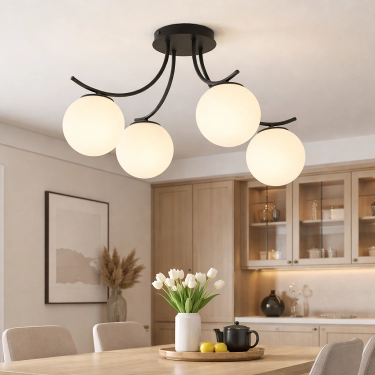 Lampa sufitowa BIRCAN to nowoczesne oświetlenie do jadalni i salonu. 4-punktowa konstrukcja, szklane klosze i czarna oprawa zapewniają styl oraz funkcjonalność. Idealna lampa do jadalni nad stół i eleganckich wnętrz.