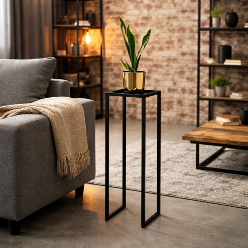 Nowoczesny kwietnik w stylu industrialnym – minimalistyczna metalowa konstrukcja idealnie eksponuje rośliny w salonie, loftowym wnętrzu lub biurze. Połączenie czerni i złota dodaje elegancji i podkreśla nowoczesny charakter aranżacji.