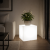 Podświetlana donica LED 50x50x50 cm w formie nowoczesnej kostki to stylowa dekoracja do salonu, tarasu i ogrodu. Emituje miękkie światło, tworząc wyjątkowy klimat i eksponując rośliny. Trwała, energooszczędna i odporna na warunki atmosferyczne.