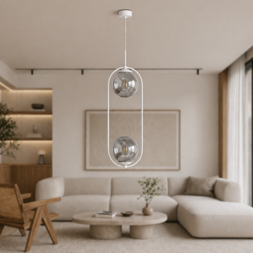 Nowoczesna lampa wisząca o minimalistycznej formie z podwójnymi, szklanymi kloszami. Idealna do salonu lub jadalni, zapewnia eleganckie oświetlenie i designerski akcent. Doskonale wpisuje się w styl skandynawski i nowoczesny.