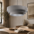 Nowoczesna lampa wisząca z trzypoziomowym abażurem w odcieniu szarego weluru. Designerskie oświetlenie do salonu, jadalni i sypialni, łączące elegancki styl z przytulnym światłem. Idealna do wnętrz loftowych, nowoczesnych i glamour.